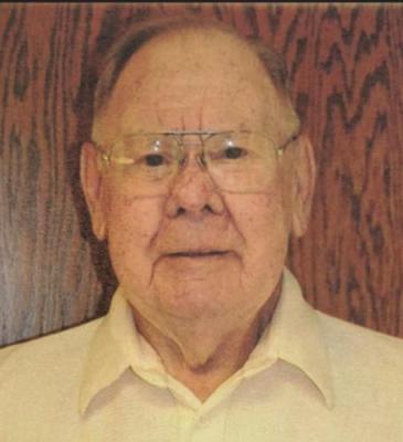 RUSSELL E. HILKER
