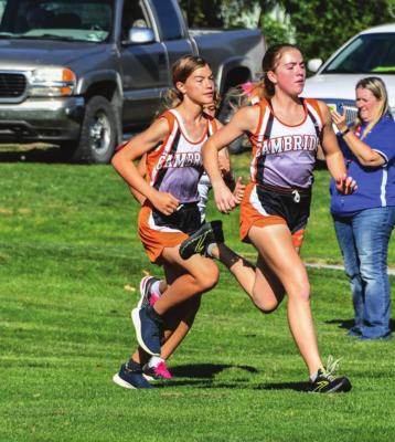 Cambridge’s Brenna Deterding, Rachel Harris and Megan ten - Bensel led Cambridge to a runner-up finish at RPAC.