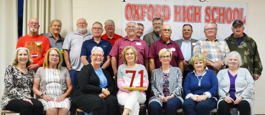 Oxford High School Class of 1971 - Tom Tejcka, Duane Murdoch, Terry Thulin, Richard Hester, Alan Hays, Stewart Penrod, Kurt Tarkington, Steve Knuth, Kevin Welsh, Ron Fryda, Ron Blue, Tom Hellner. Front:Roxanne Dusenbery Wolzen, Sandy Parsons Daley, Gaye Birt McCallum, Tuwanna Quinn Hammond, Mary Ann Kruback Broeker, Lynn Struve Weatherwax, Cynthia Stockwell Powell. In photo unable to see Scott McGee. Also in attendance but not pictured Dea Furby Wilson, Keith Bose, Robert Land.