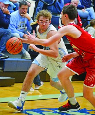 The Southwest boys basketball team took on two of the top teams in the region last week, falling 80-56 to Dundy County-Stratton and 75-37 to Perkins County to fall to 7-12 this season. Pictured is Colin Day driving into the paint against Perkins County.
