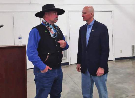 Trent Loos (left) and Governor Pete Ricketts led a town hall discussion on opposition to what they called the “30x30 land grab” in McCook last Wednesday.