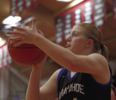 The Warriors’ Clara Hilker fires a jumpshot.