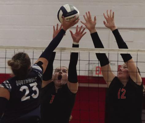 Trojans hold off Roughriders for title