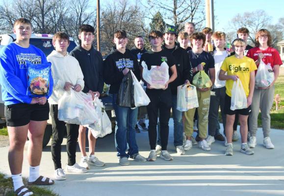 The Arapahoe Boys basketball team continues the tradition of collecting food for the Arapahoe Food Pantry again this year. The team went to several houses and collected much needed food for the pantry. They delivered the items on Monday, Nov. 25th. The Arapahoe Food Pantry will be closed on Christmas Eve.