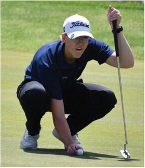 Southwest’s Colton Sedlacek gets the read on a putt at the Cattle Trail Tournament Tuesday in Curtis.