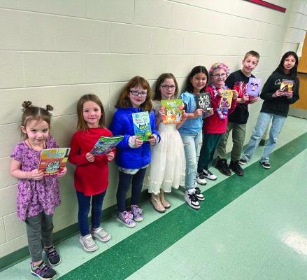 Elwood students enjoy the teammates Book Vending machine