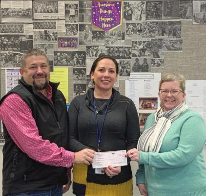 MNB insurance donates to the backpack program