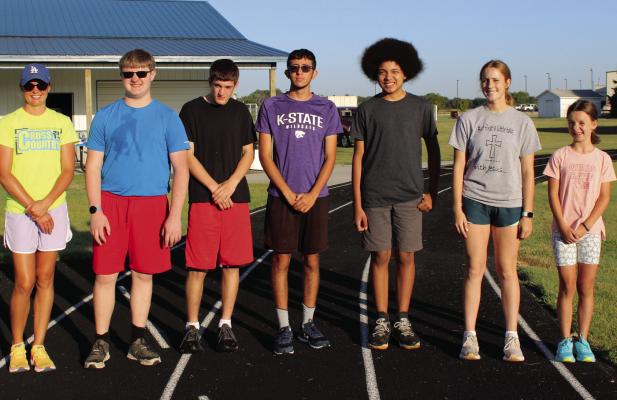 The Southwest cross country team is pictured as follows from left: Coach Makenzie Slaten, Aden Schaffert, Caleb Heskett, Austin Thompson, Shie King, Avery McConville, Alivia Cure (Not pictured: Morgan Reeder)