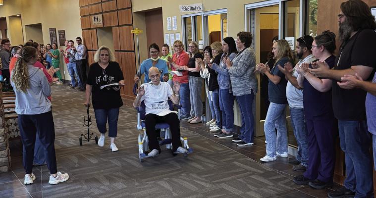 On Friday, Tri Valley Health System employees lined the halls to honor Mark Harpst with a special Honor Walk celebrating his retirement and decades of service.