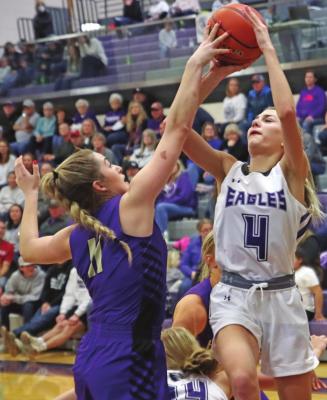 Southern Valley’s Adi Hunt challenges a Holdrege defender in the paint.