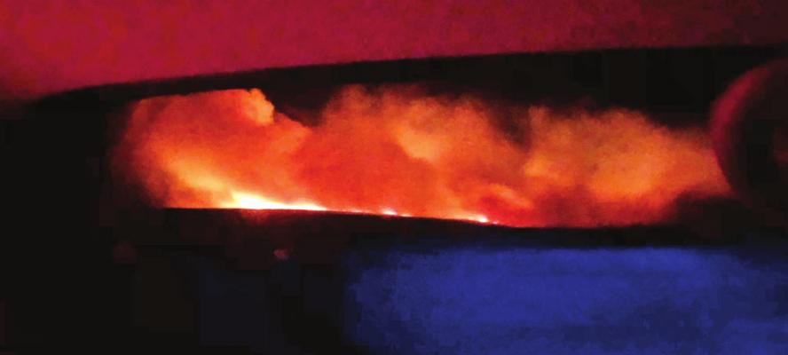 Wild fire burns Thursday night between Bartley, Lebanon