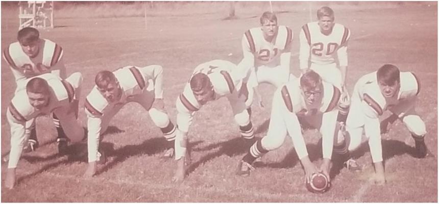 Indianola’s 1966 8-man team in tlieir single-wing formation with Liess at quarterback.