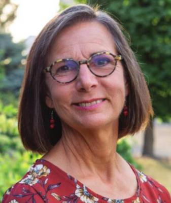 JOANIE HOLM, R.N., C.N.P.