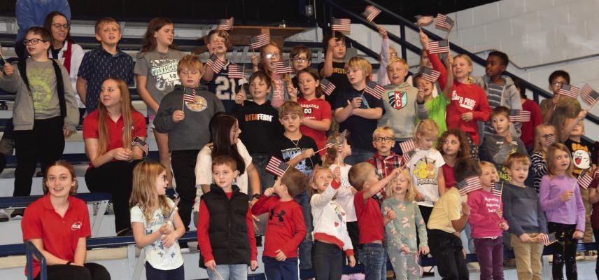 Arapahoe Elementary students sang “It’s a Grand Ole Flag”