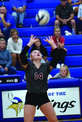 Hi-Line’s Zoey Evans sets a teammate.