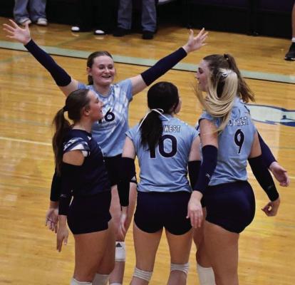 Southwest celebrated back-to-back RPAC Titles with a fourset win over Maywood-Hayes Center Tuesday night.