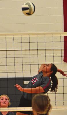 Cici Lerdall attacks a ball from the pin.
