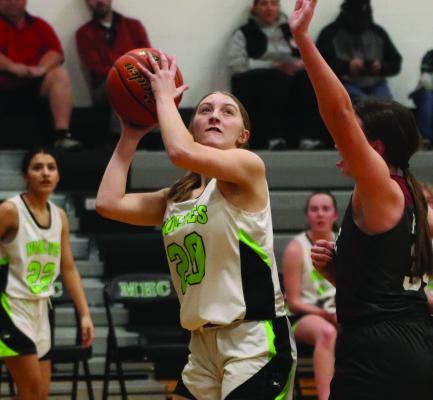 Maywood-Hayes Center’s Grace Loomis scores inside Tues- day against Hi-Line.