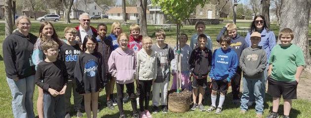 Students celebrate Arbor Day planting trees