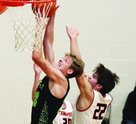 Trojans snatch victory from jaws of Wolves