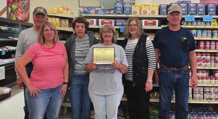 Pictured above: 2020 Elwood Nebraska Chamber of Commerce Volunteer of the Year - the group that unloads the grocery truck for the Elwood Hometown Market.