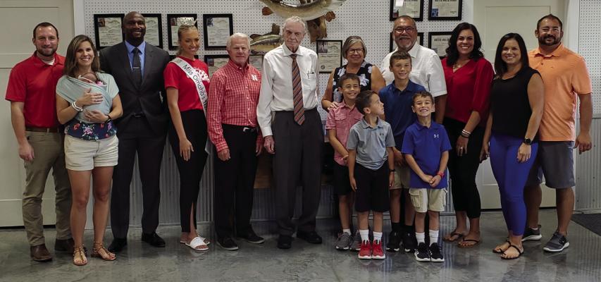 Baldonado family, The Home Agency, BHA Real Estate make contribution to aid rural Teammates chapters
