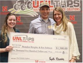 Stroebels for Robinson: The Most Profitable Sorghum award went to Brandon Rimpley of Orleans, and Ron Robison of Alma. There to accept the award presented by Kristine Dvoracek-Jameson from the NE Sorghum Board were Ron’s daughter and son-in-law, Brent and Adrian Stroebel.