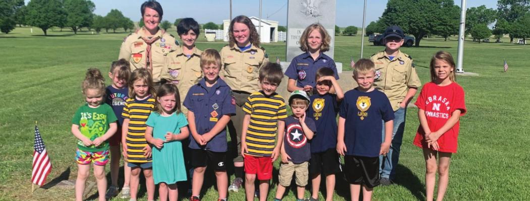 Scouts Place Flags on Veterans Graves at Arapahoe Cemetery