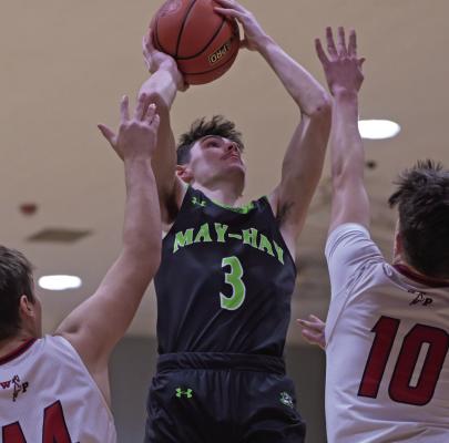 MHC’s Charlie Callis rises for a jumper in the lane.