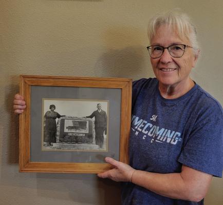 Joan Stewart of McCook, great-great-granddaughter of flood survivor, Mary Osmera, is shown with a photo of Mary and her brother and fellow survivor, John. Joan and the Osmera family provided much of the information in these articles.