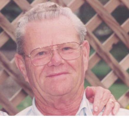 MAX E. TOMLIN