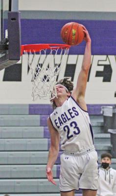 Southern Valley’s Carter Bose throws one down against Franklin.