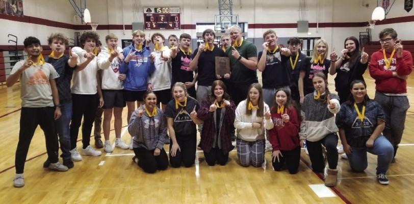 The Elwood One Act team captured first place at the Fort Kearny Conference One Act compe- tition at the Tassel in Holdrege last week. Axtell finished as runner-up.