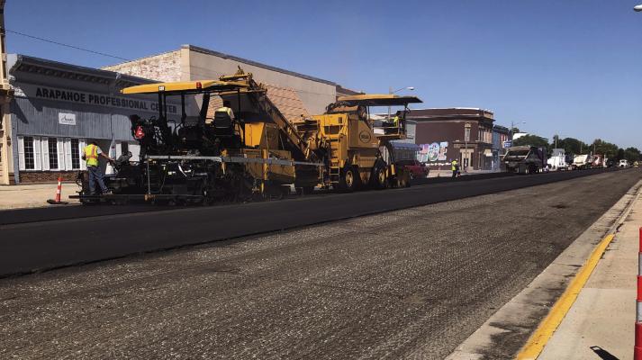 Road Crews Work  Downtown  Arapahoe