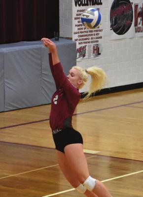 Hi-Line’s Carley Thompson saves a ball in the back row against Medicine Valley.