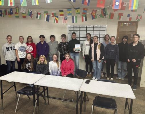 (Left) Elwood Public School hosted Megan Bellamy, Elwood alum and courtroom stenographer, to share about her career with interested students. She brought the machine she uses to show students how courtroom reporting works. Such a fascinating career that requires two years of postsecondary education and can be done full-time or freelance.
