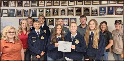Back Row Left to Right: Megan Sprague- Farm Credit, Ethan Oberg-FFA Reporter, Christian Maurer-Secretary, Dave Gross-Farm Credit, Garett Pollard-Farm Credit, Jaymie Johnson-Farm Credit, Molly Aden-FFA Alumni. Front Row Left to Right: Dannyl Bromander-Farm Credit, Bladen Williams-FFA Sentinel; Madison Woehrle Vice-FFA President, Grace Schimmels- FFA President; Whitney Page-FFA Treasurer
