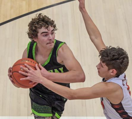 Maywood-Hayes Center’s Kade Broz drives inside against Wauneta-Palisade last week.