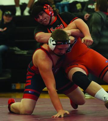Cambridge’s Jordan Ruf turns his opponent to his back.