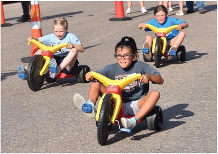 CAMBRIDGE - From the big wheel races on Friday evening and Hobo Corn that night, to inflatable water slides, a parade and a steet dance on Saturday, Medicine Creek Days brought out big crowds for a good time to celebrate the 75th Anniversary of the Medicine Creek Dam.