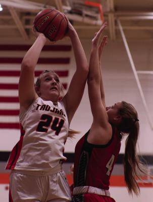 Cambridge’s Brylyn Springer scores in the lane.