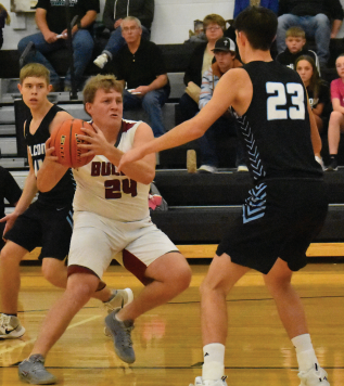 Cade Schmidt makes a move in the paint.