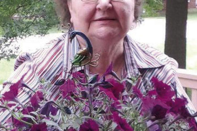 BEVERLY E. SMITH