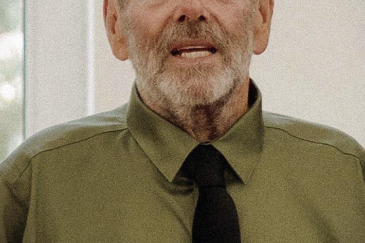 MARK E. HESKETT