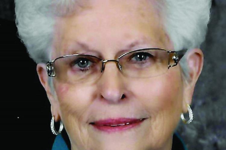 ILA M. WARNER