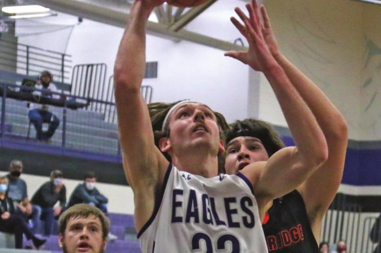 Southern Valley’s Carter Bose powers up for a layin.