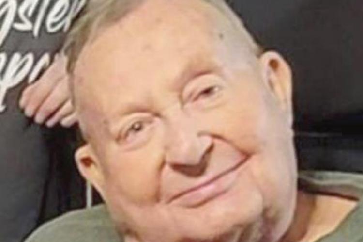 MILTON J. SLAMA