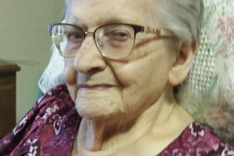 LUELLA C. SMITH