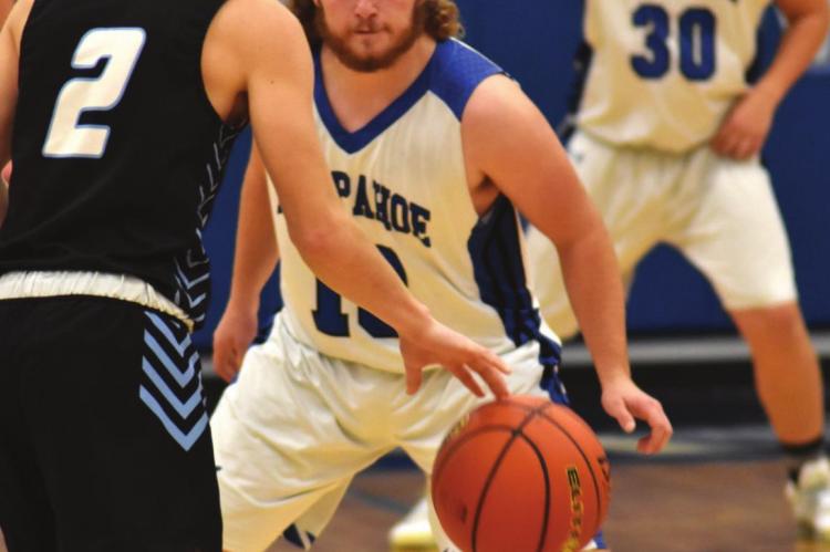 Arapahoe’s Cord Frink guards the ball against Wilcox-Hildreth.
