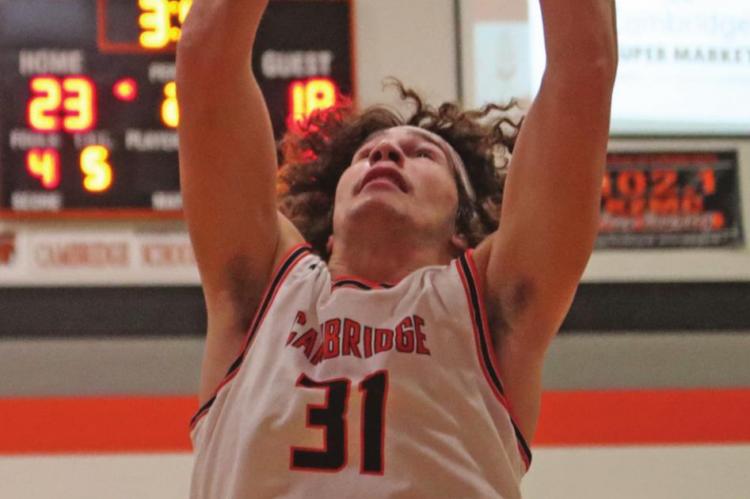 The Trojans’ Dahlton Wood skies for a rebound.